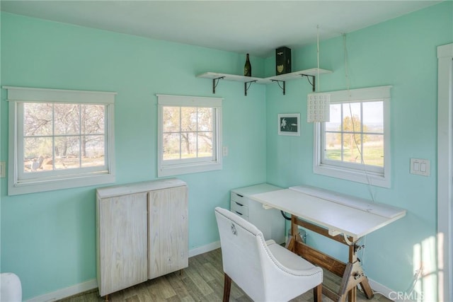 office area with light hardwood / wood-style floors