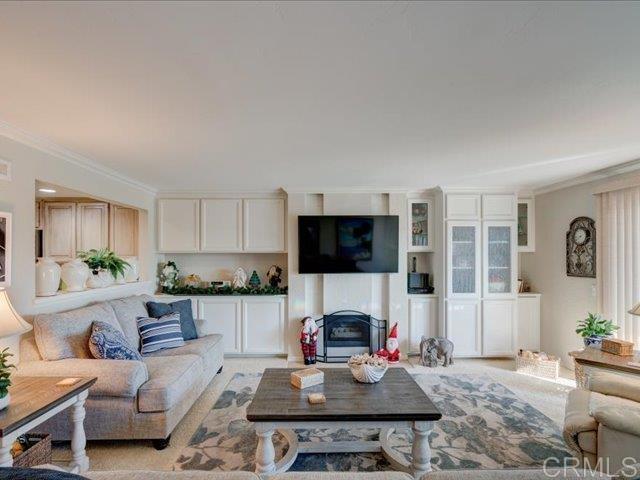 living room with crown molding