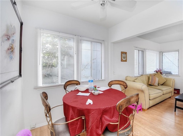 dining room featuring light hardwood / wood-style flooring and ceiling fan