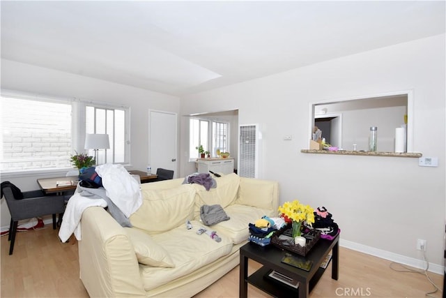 living room with light hardwood / wood-style floors