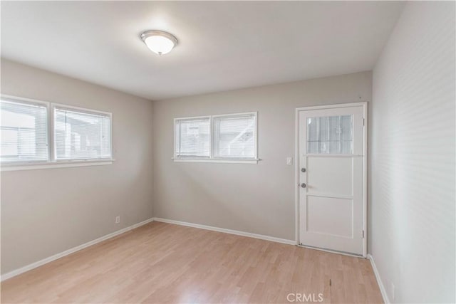 interior space with plenty of natural light and light wood-type flooring