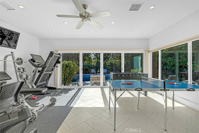 interior space featuring ceiling fan