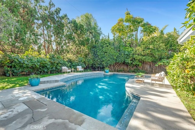 view of swimming pool featuring a patio