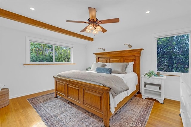 bedroom featuring ceiling fan and light wood-type flooring