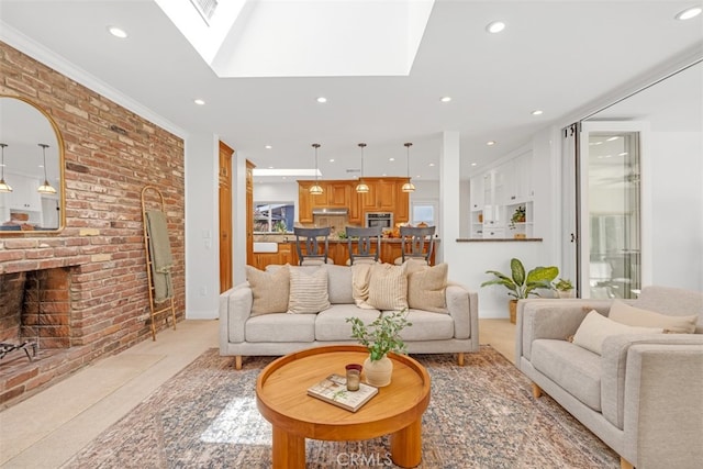 carpeted living room with a brick fireplace and a skylight