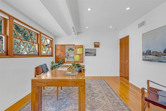 office space with light hardwood / wood-style floors