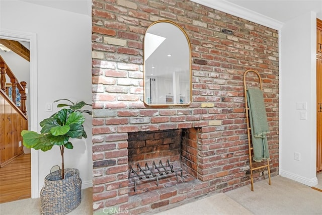 unfurnished living room featuring a fireplace and carpet