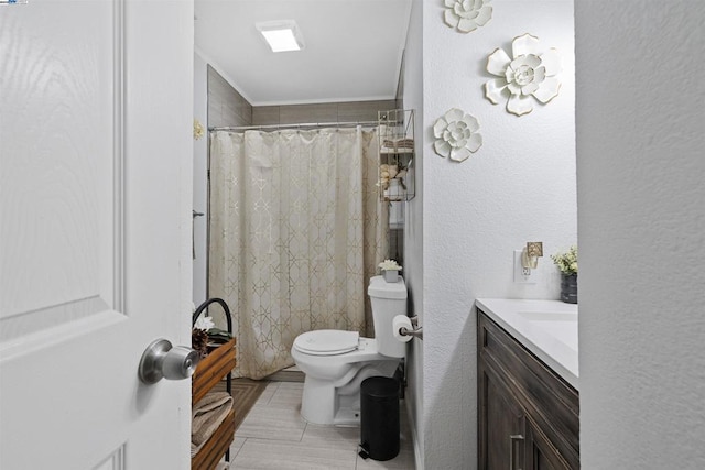 bathroom featuring vanity, curtained shower, and toilet