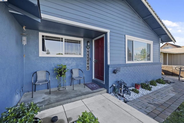 doorway to property featuring a patio