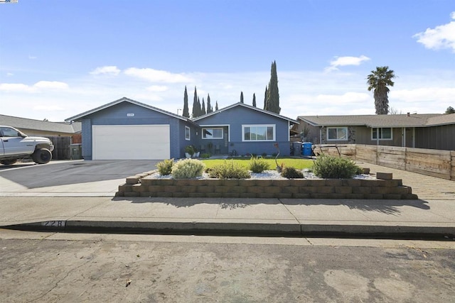 single story home with a garage