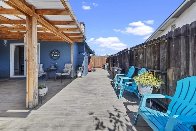 view of patio featuring a wooden deck