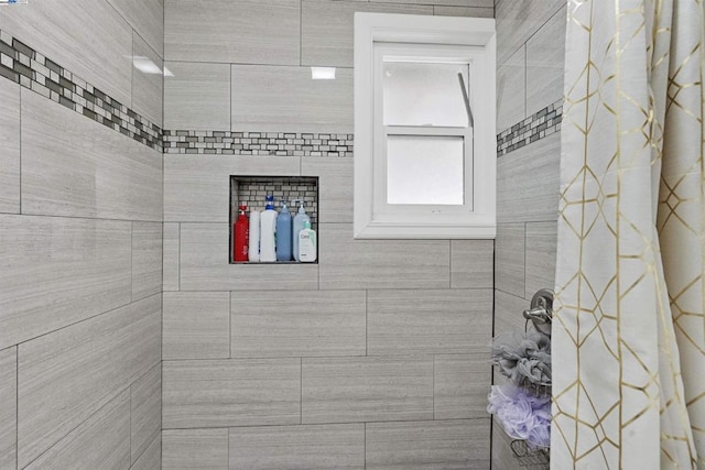 bathroom with a shower with curtain