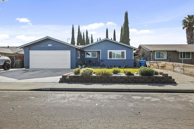 single story home featuring a garage