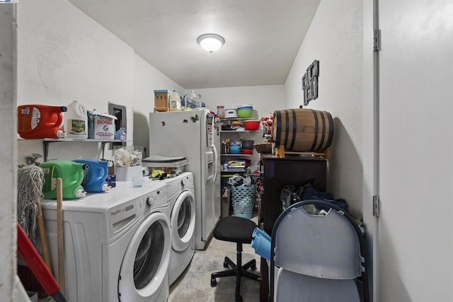 washroom featuring washer and dryer