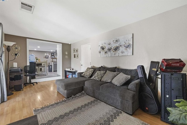 living room with hardwood / wood-style floors