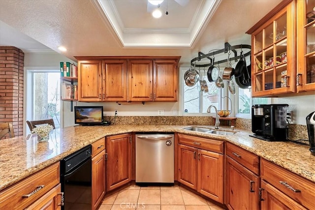 kitchen with dishwasher, light stone countertops, sink, and ornamental molding