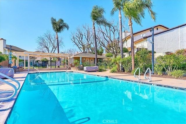 view of pool featuring a pergola and a patio area