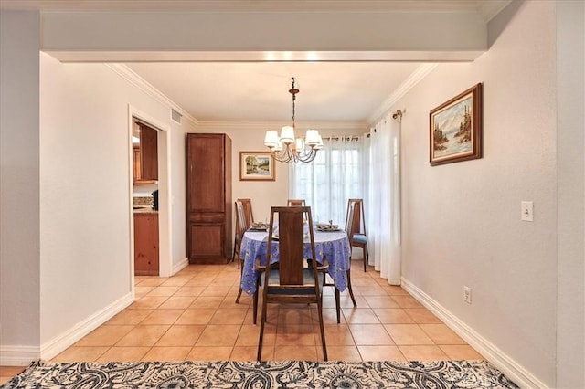 tiled dining room featuring an inviting chandelier and crown molding