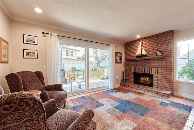 living room featuring crown molding, a brick fireplace, a textured ceiling, and light tile patterned floors