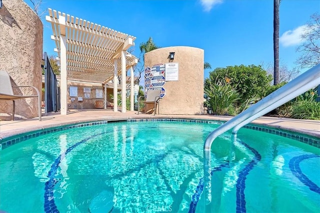 view of pool with a pergola