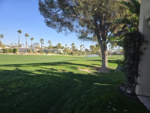 surrounding community featuring a water view