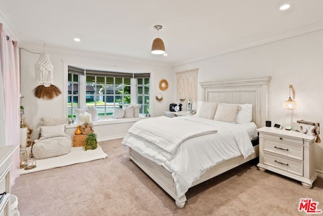 bedroom featuring ornamental molding and light carpet