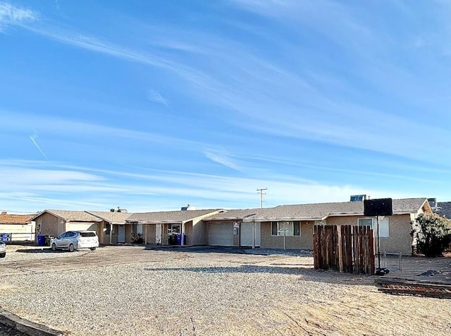 ranch-style home with a garage