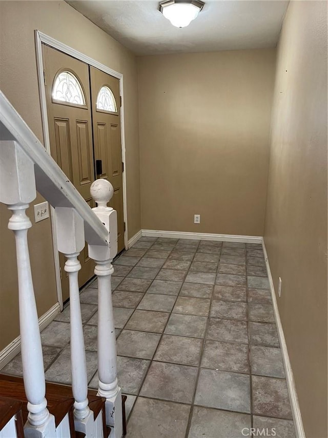 view of tiled foyer entrance