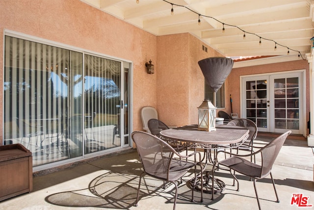 view of patio featuring french doors