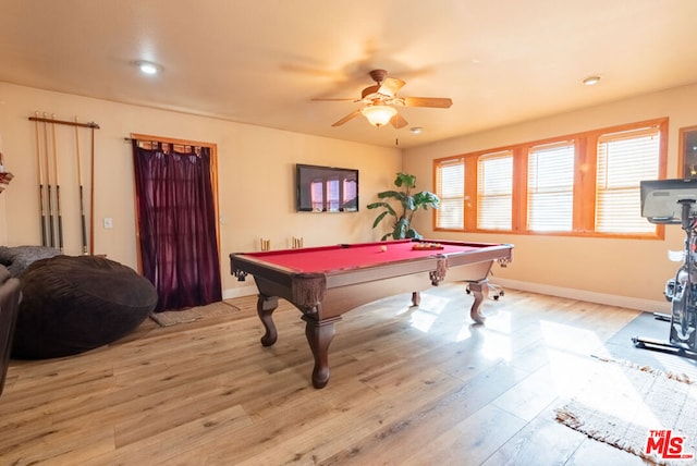 recreation room featuring billiards, ceiling fan, and light wood-type flooring