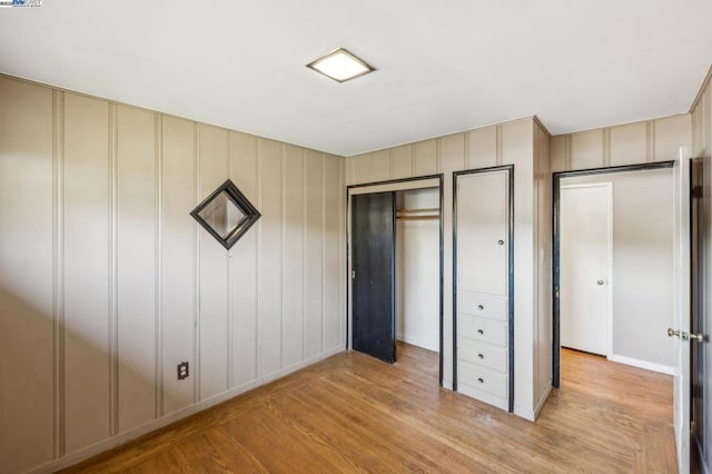 unfurnished bedroom featuring light hardwood / wood-style flooring