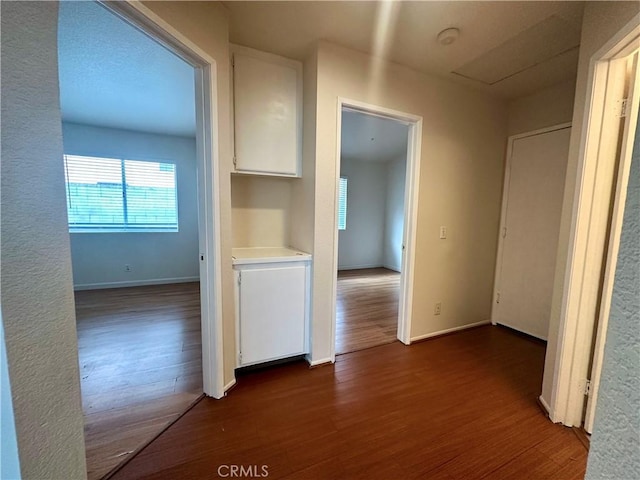 hall featuring dark hardwood / wood-style flooring