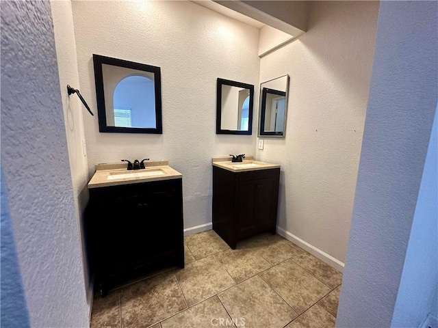 bathroom featuring vanity and tile patterned flooring