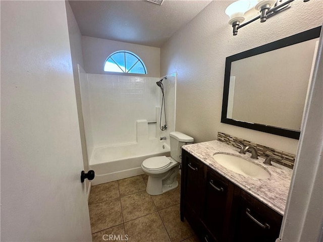 full bathroom with vanity, tile patterned flooring, tub / shower combination, and toilet