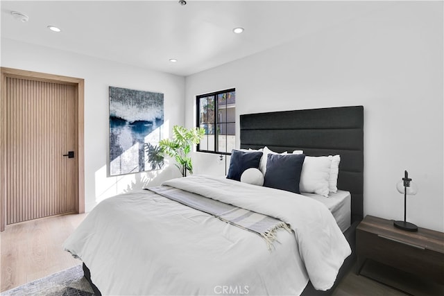 bedroom featuring hardwood / wood-style floors