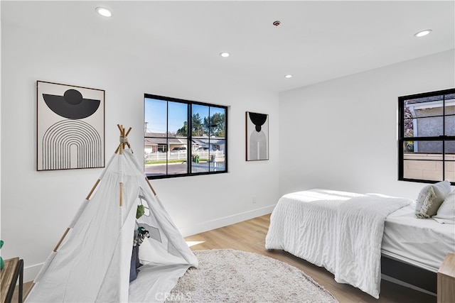 bedroom featuring light hardwood / wood-style floors