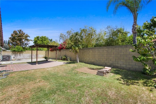 view of yard featuring a fenced backyard and a patio area