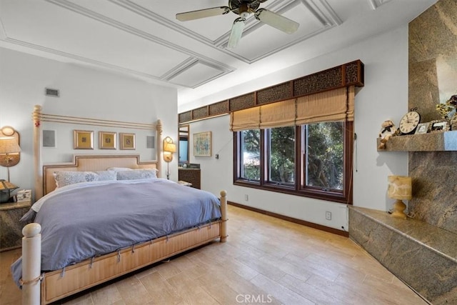 bedroom with light hardwood / wood-style floors and ceiling fan