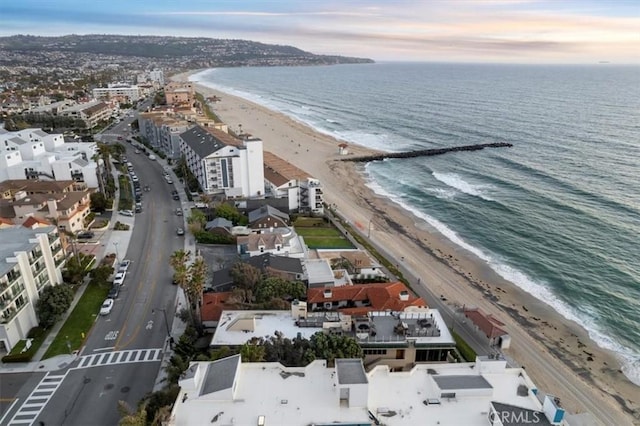 aerial view featuring a water view and a view of the beach