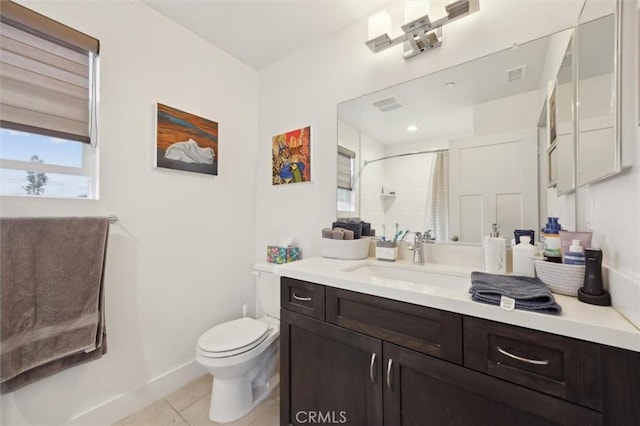 bathroom featuring vanity, toilet, curtained shower, and tile patterned flooring