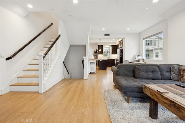 living room featuring light hardwood / wood-style floors