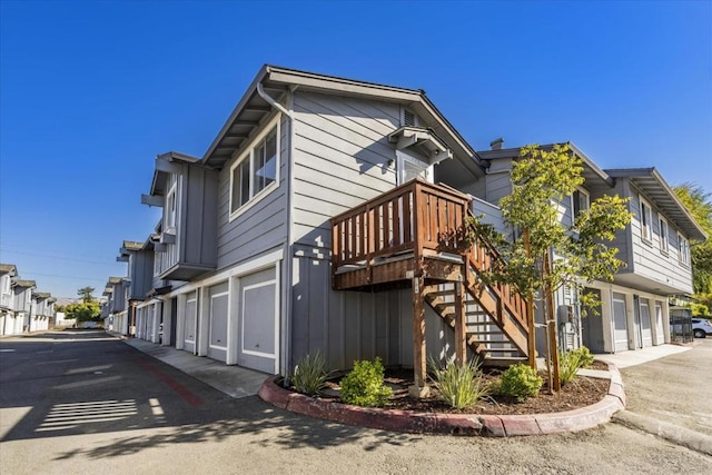 view of property exterior with a garage