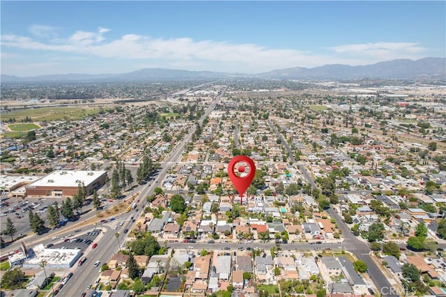 drone / aerial view featuring a mountain view