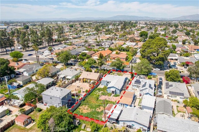 aerial view featuring a residential view and a mountain view