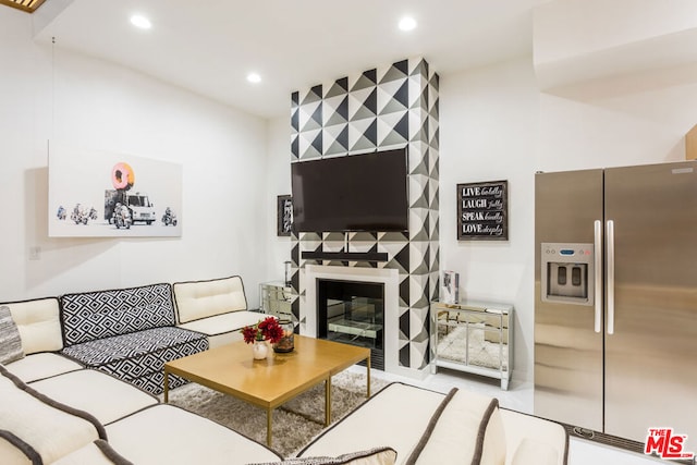 living room featuring a fireplace