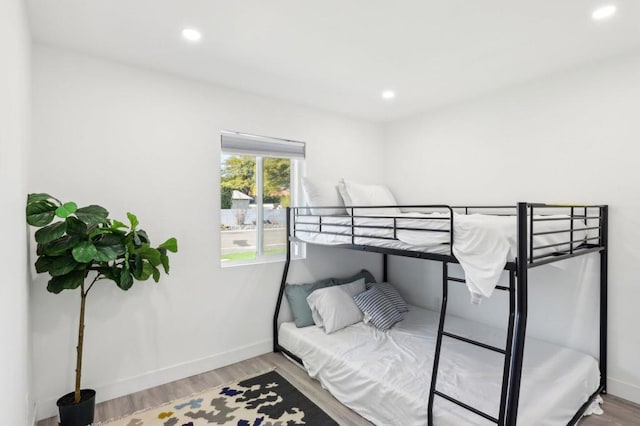 bedroom with light wood-type flooring