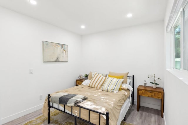 bedroom featuring hardwood / wood-style floors