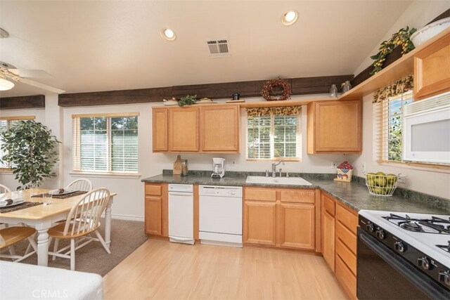 kitchen with ceiling fan, white appliances, sink, and light hardwood / wood-style flooring