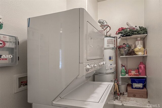 laundry room featuring stacked washer and dryer