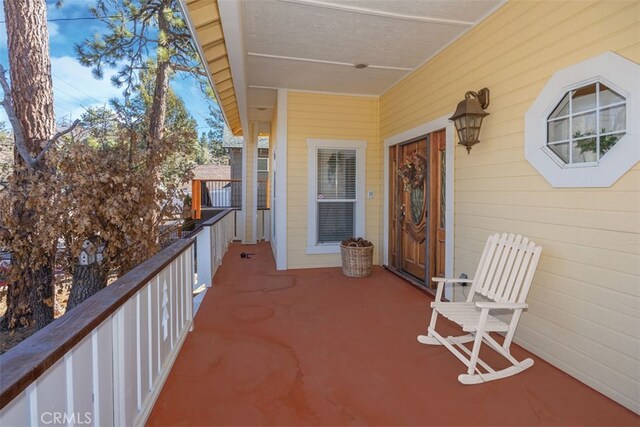 balcony featuring a sunroom